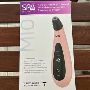 SPA Sciences MIO Pore Extraction & Microdermabrasion Device in pink
